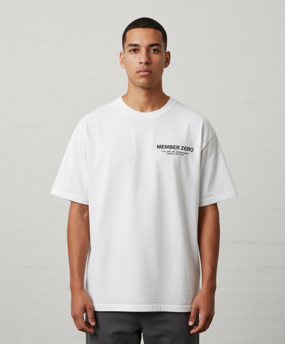 Person wearing a white t-shirt with 'MEMBER ZERO' logo against a plain background